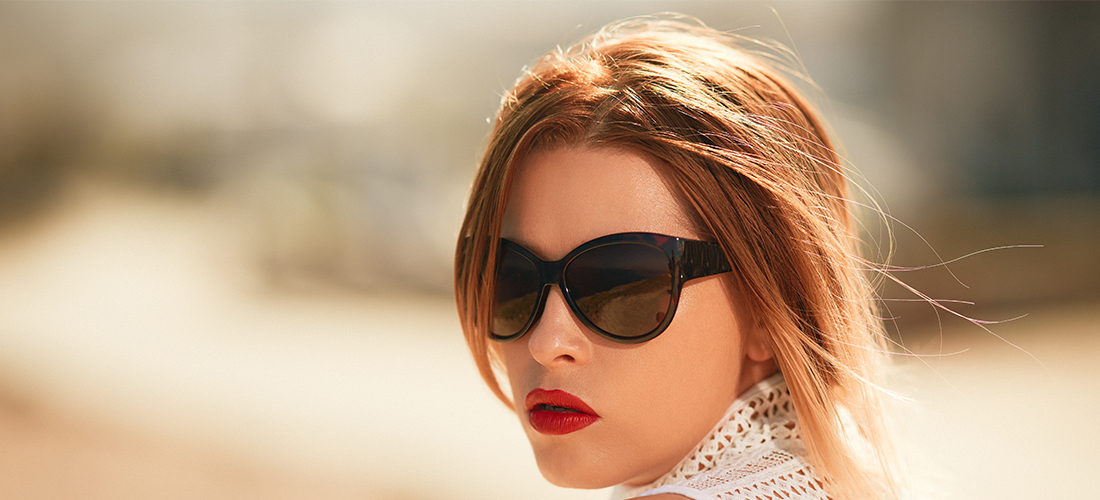 Woman With Red Lipstick And Sunglasses